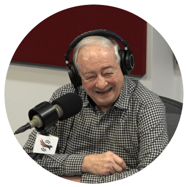 Norb Svanascini, author of The Peanut Principle, at a podcast microphone